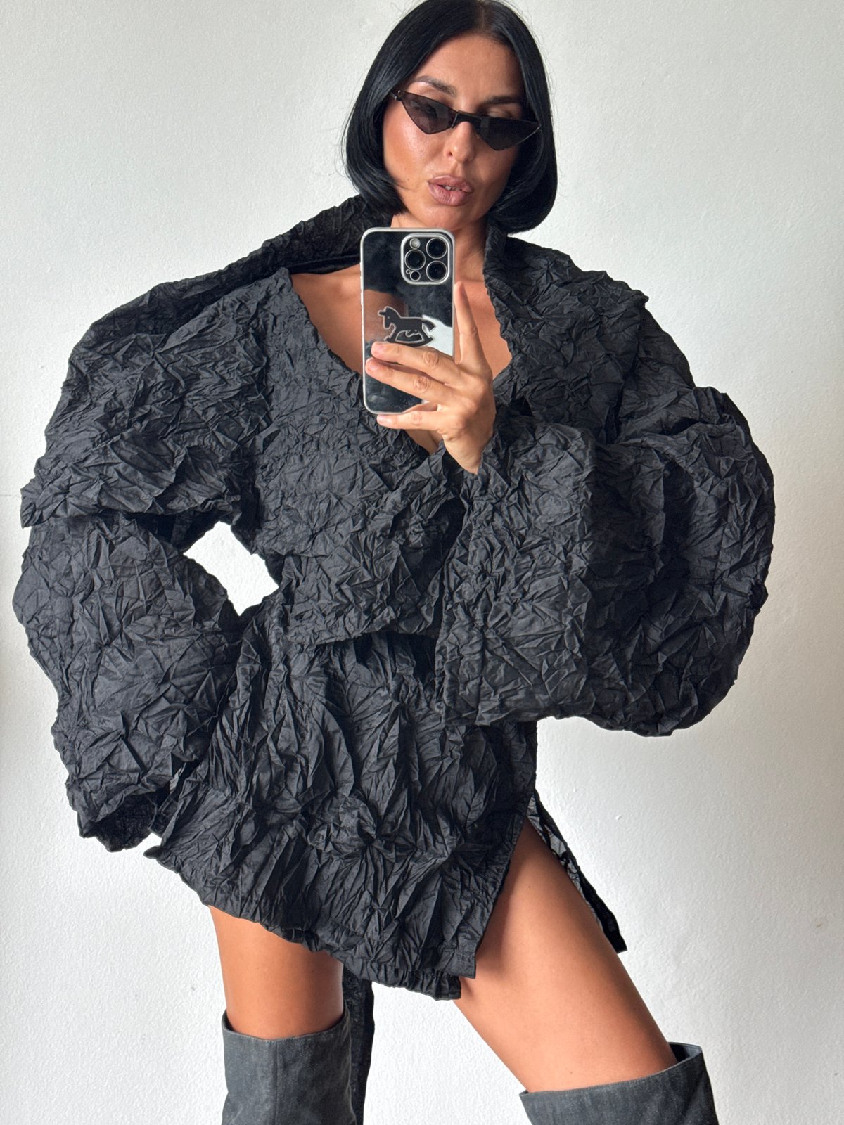 Woman takes selfie indoors in Ko Samui, Thailand