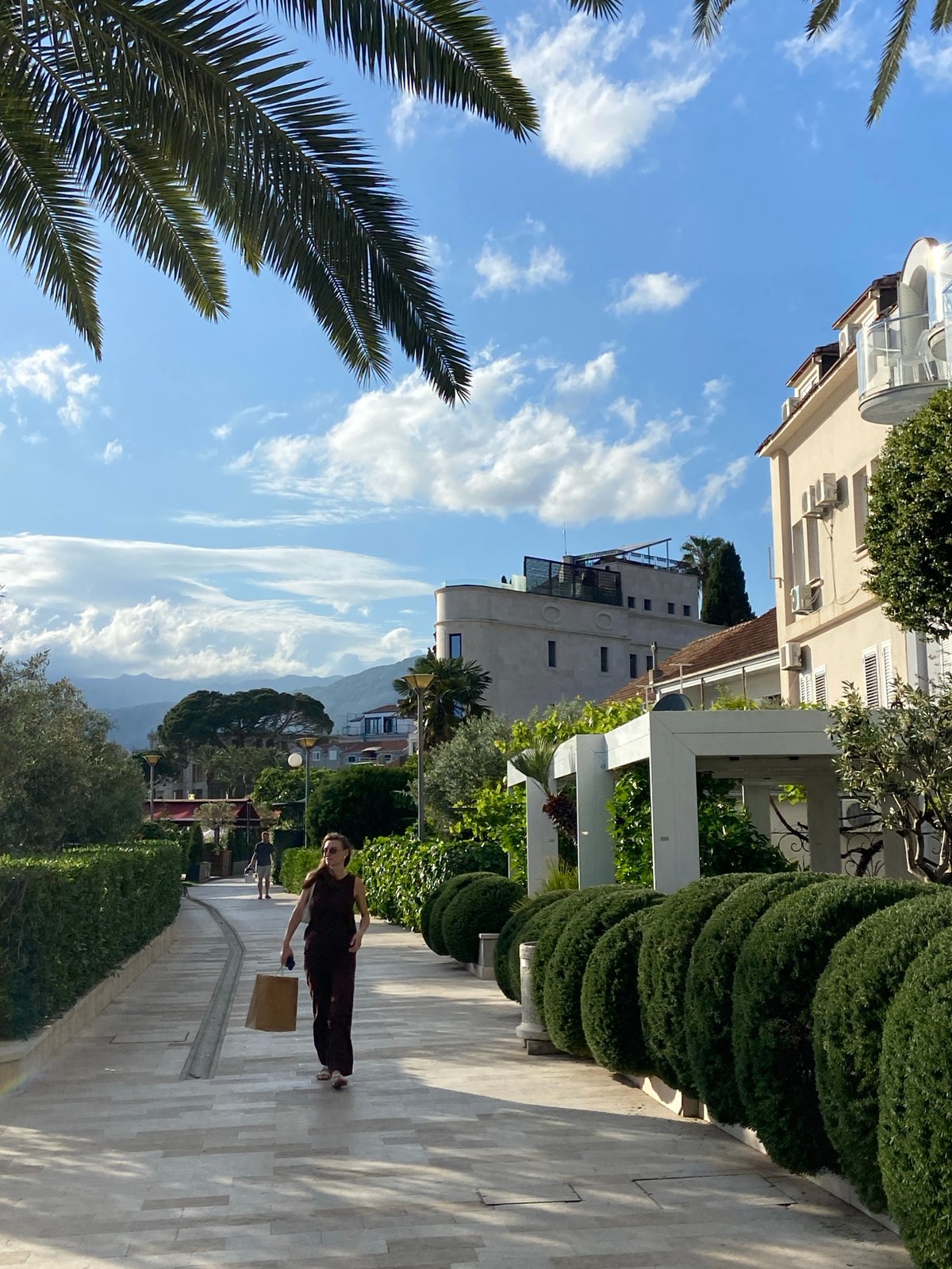 Afternoon life unfolds across Tivat's streets, beach and waterfront