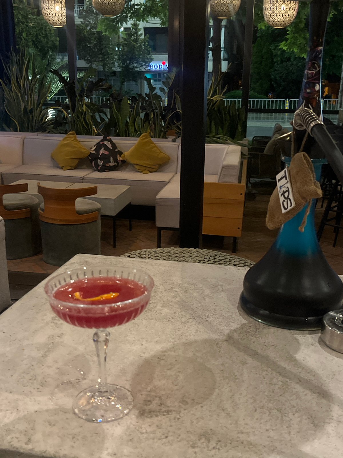 Red cocktail photographed at outdoor venue in Burgas, Bulgaria