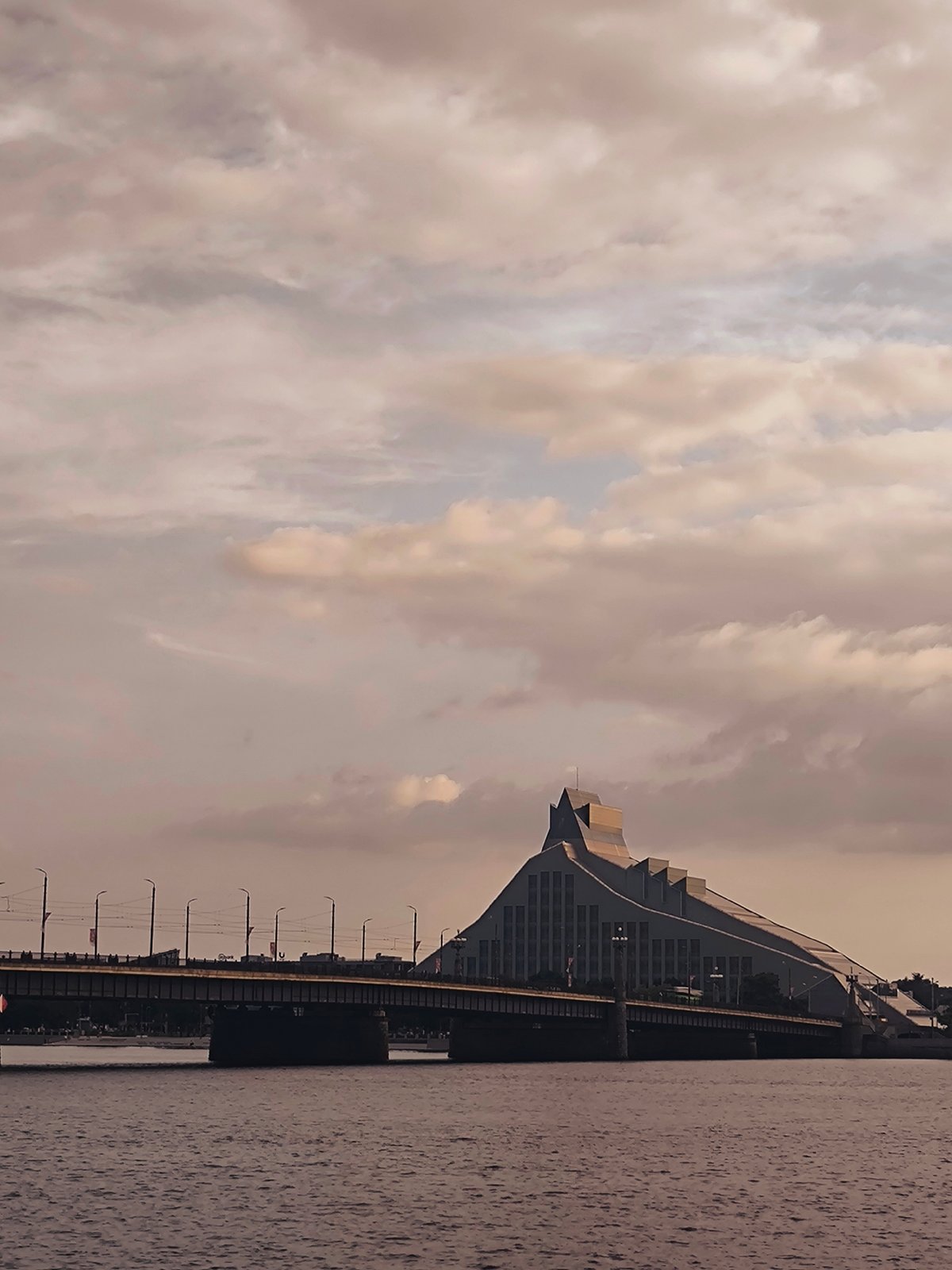 Riga's Daugava riverfront skyline at golden hour
