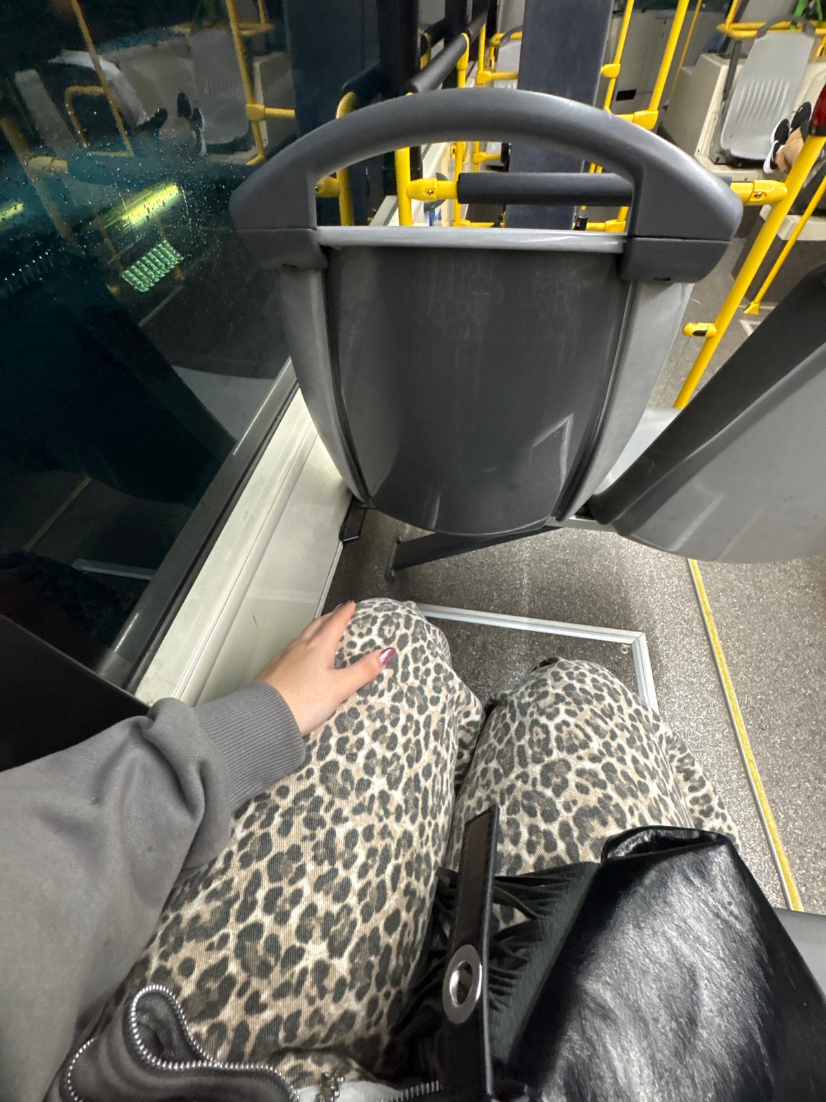 Passenger rides public transit in Córdoba, Spain