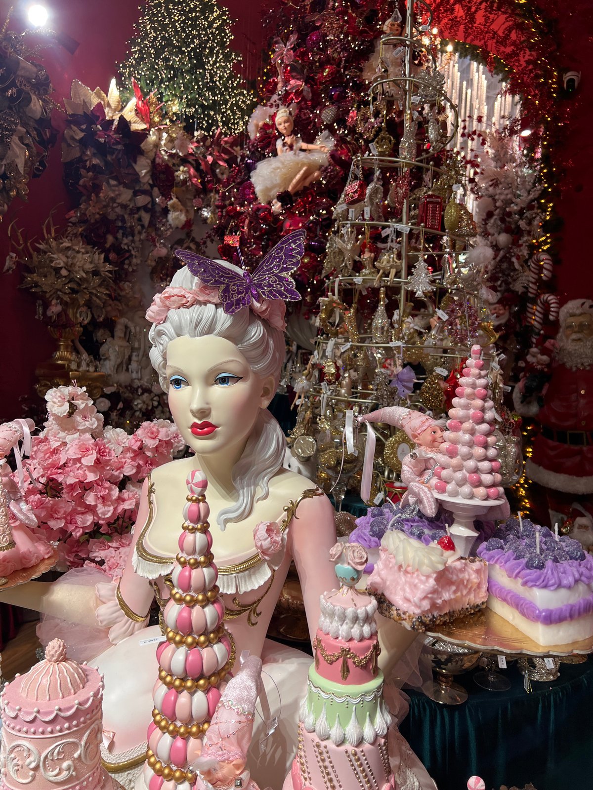 Marie Antoinette mannequin displayed among sweets in Budapest shop