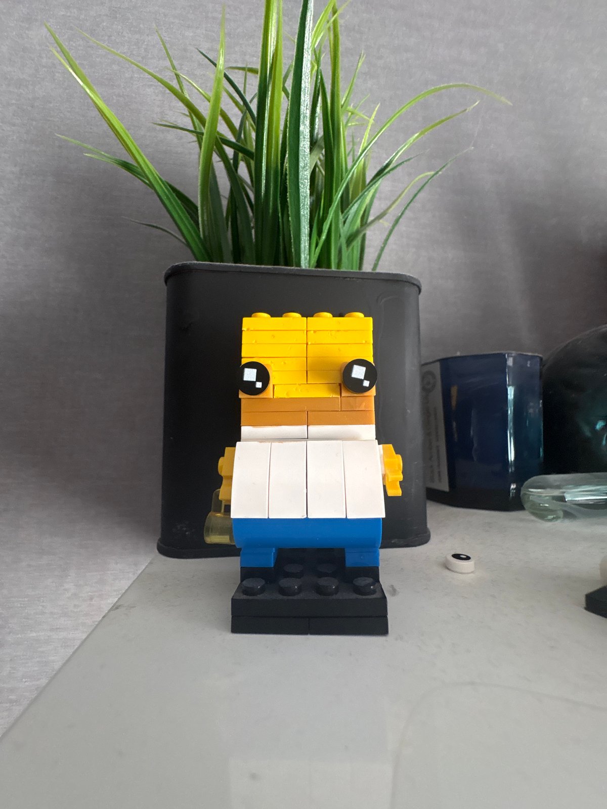 Collector Documents Gaming Setup and Art Figures in Home