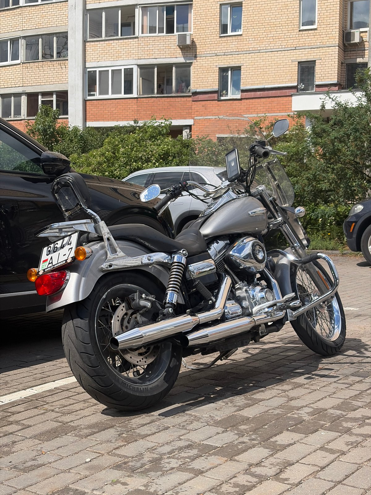 Silver Harley-Davidson Super Glide parked in Minsk