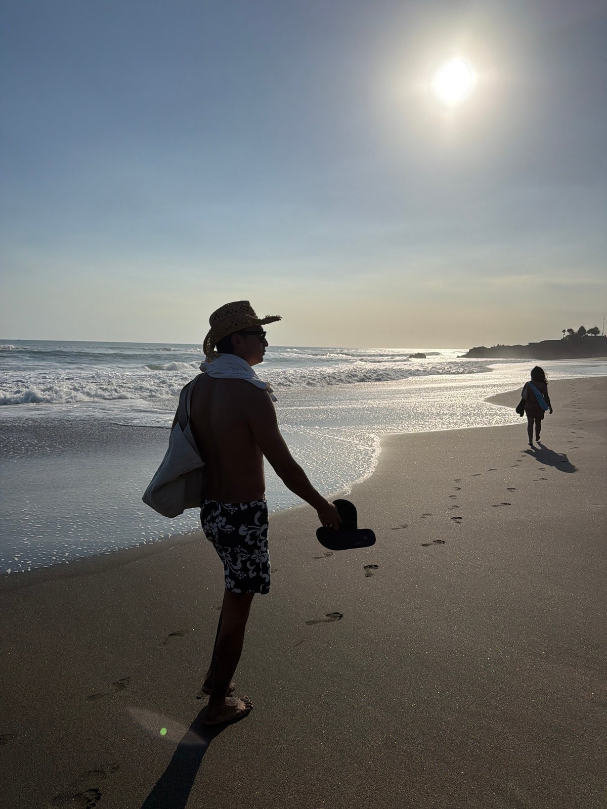 Morning on a black sand beach in Kediri, Bali