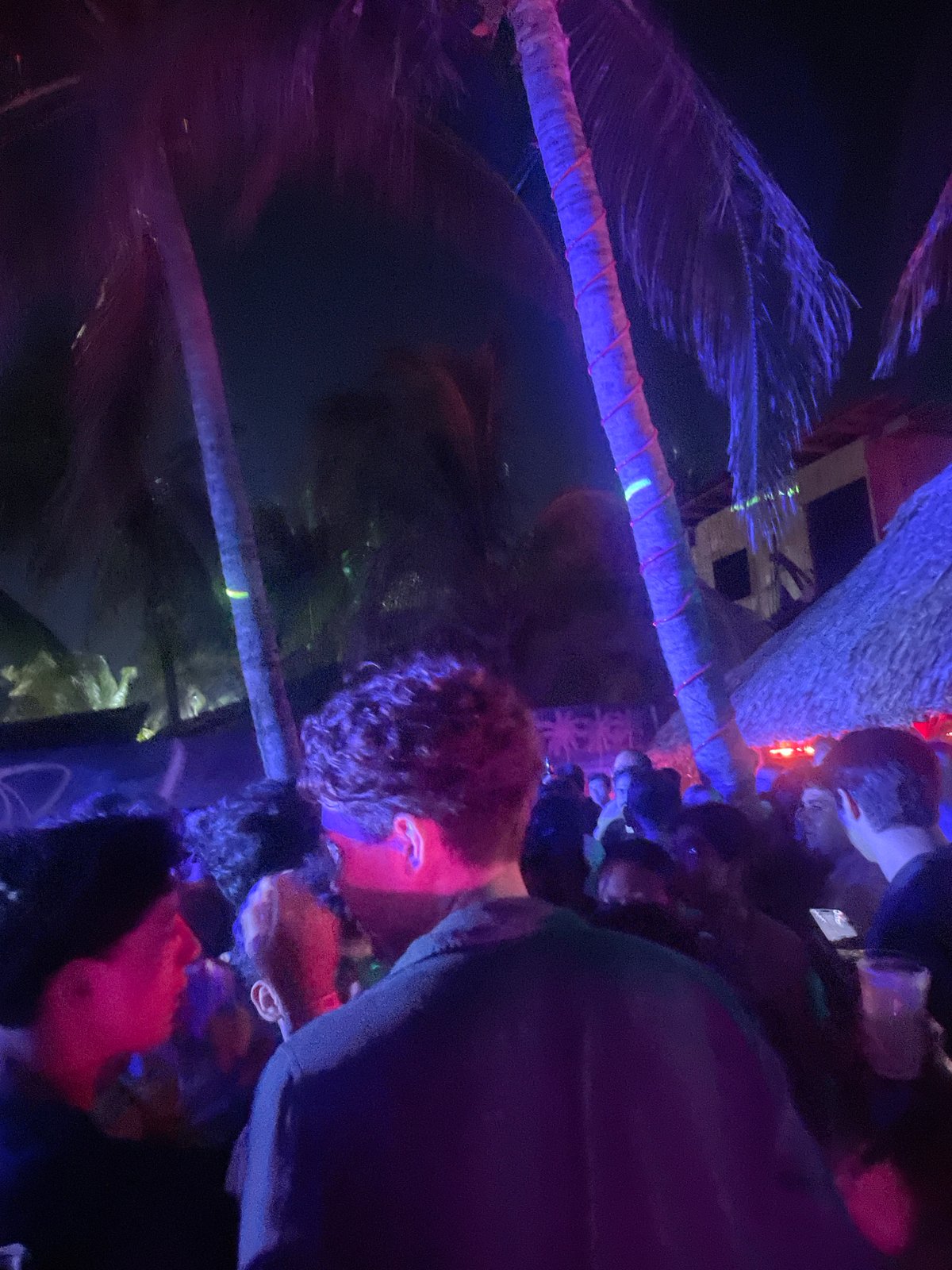 Nighttime party captured at Brisas de Zicatela beachside venue