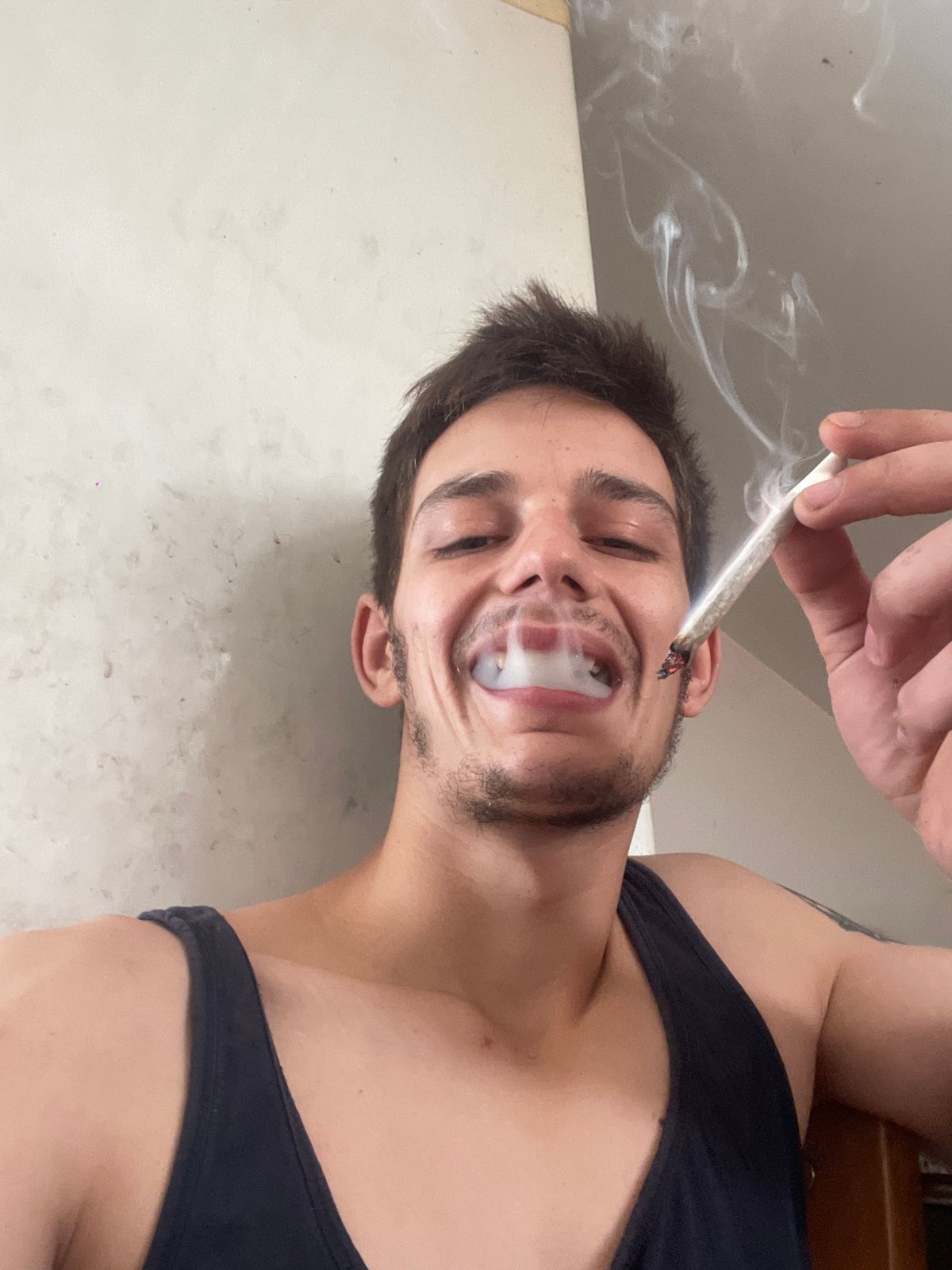 Lazy morning in bed, smoking and goofing around for the camera.