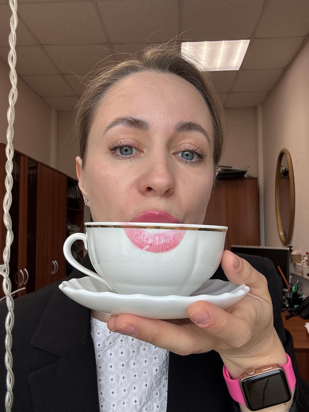 Woman photographed drinking tea in Chaikovsky, Russia