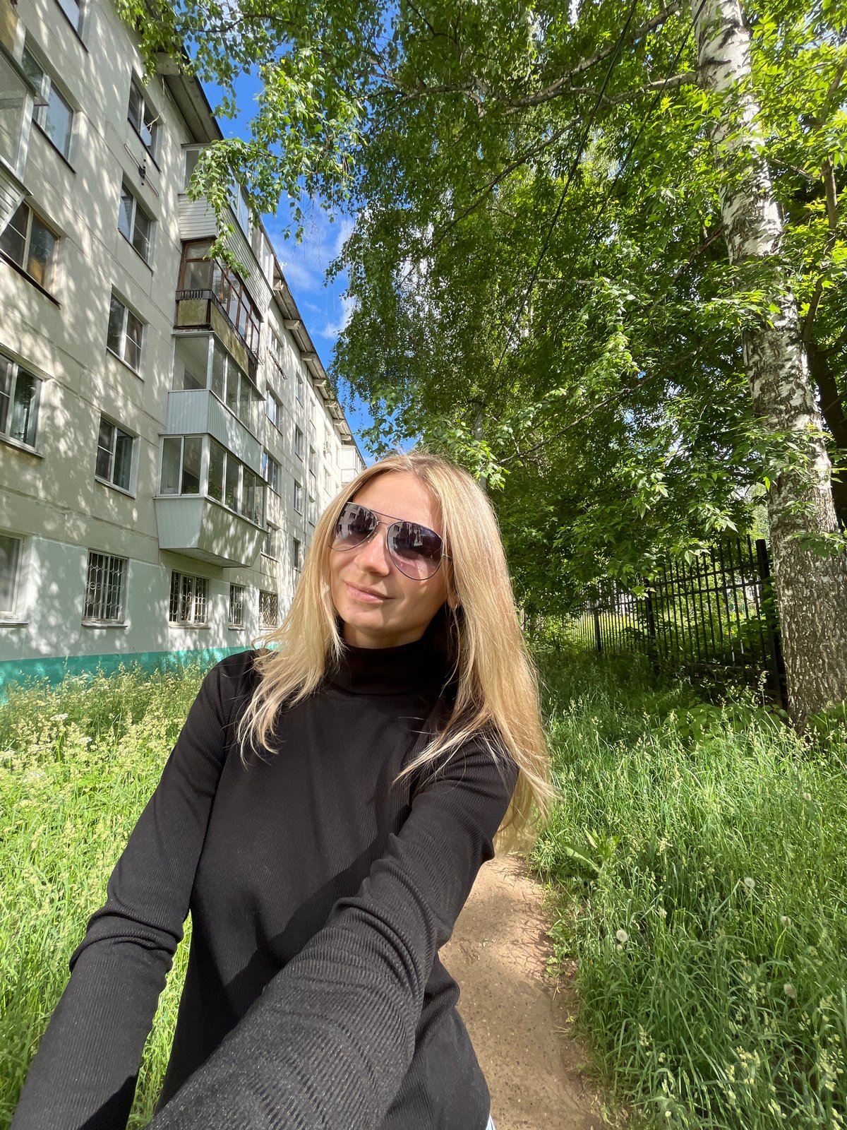 Person takes playful selfies with Yorkshire Terrier in Chaikovsky