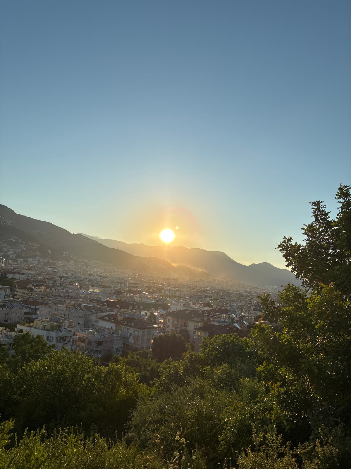Elevated views across Alanya's coastline and city at sunrise