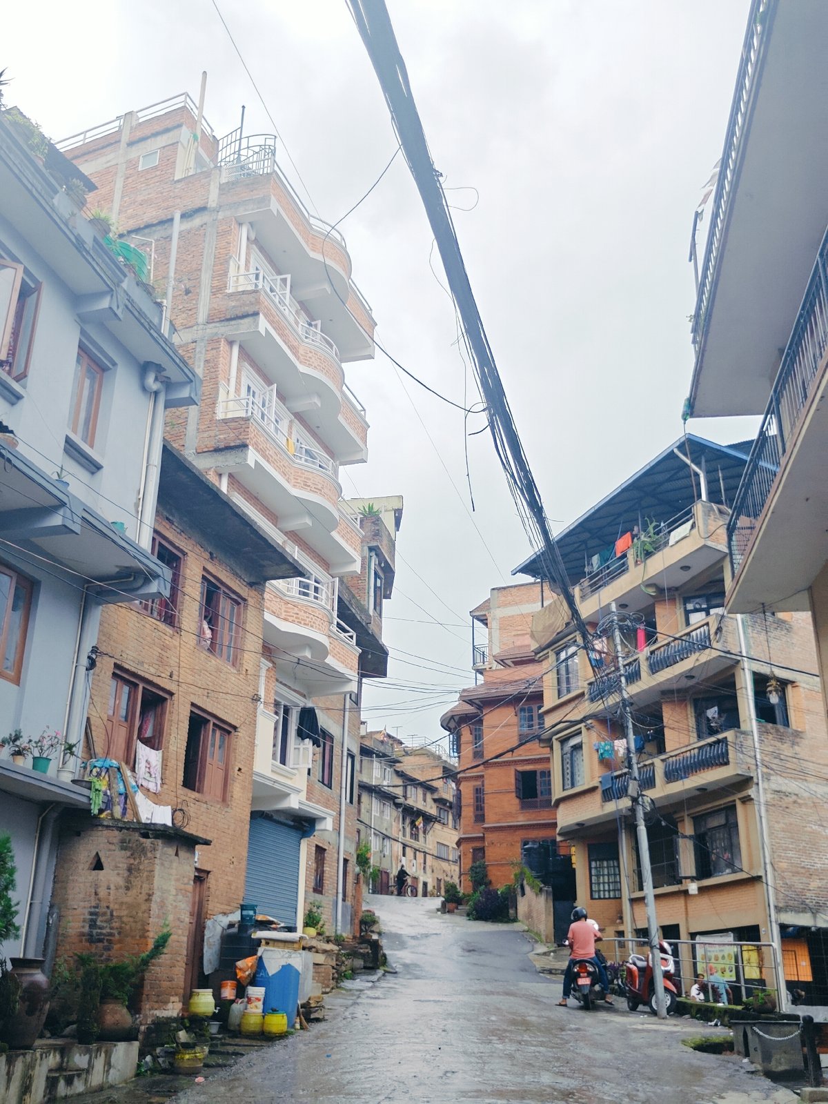Wet morning streets and everyday life in Kirtipur, Nepal