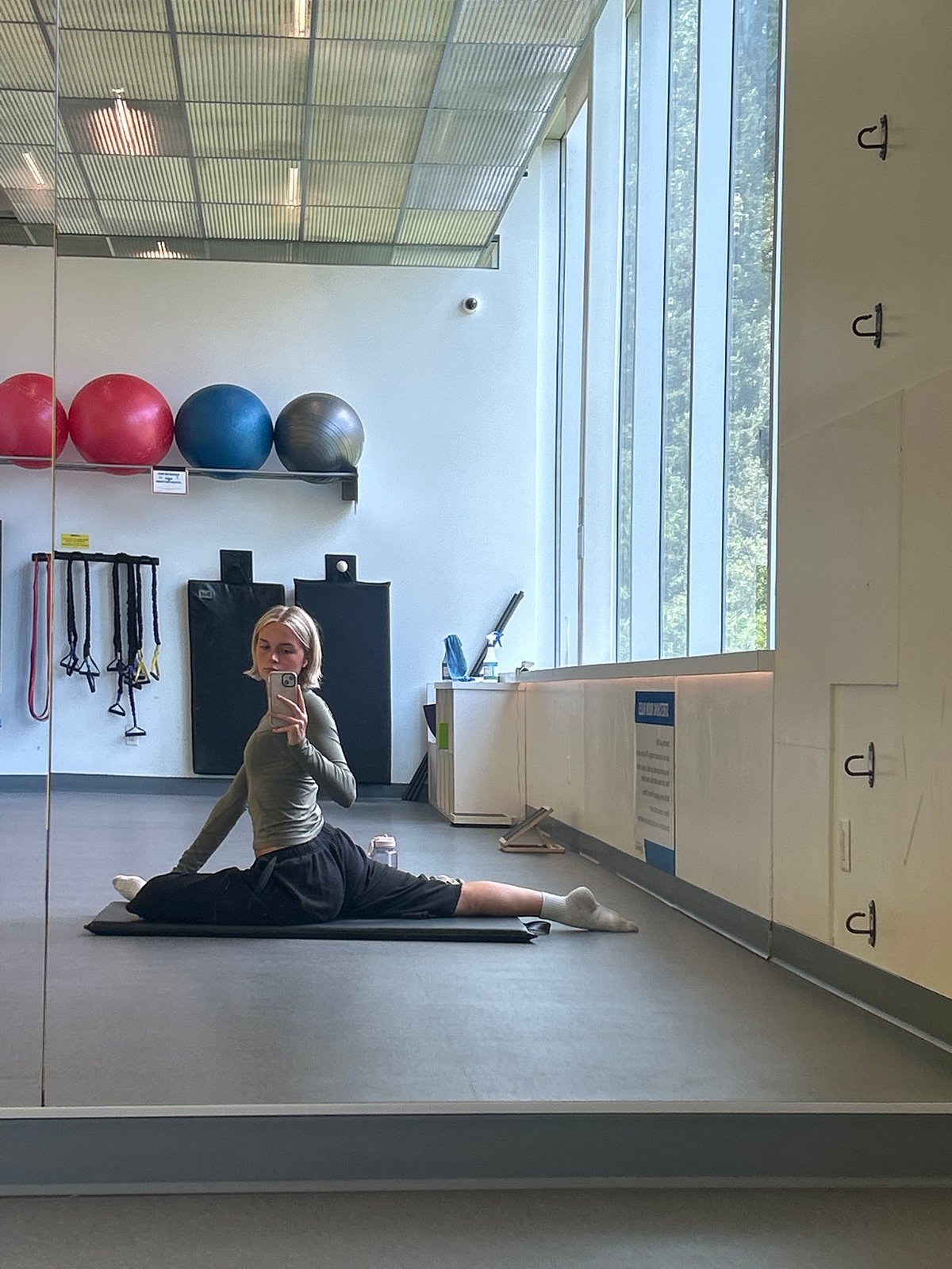 Gym selfies and stretching on a yoga mat in Whistler