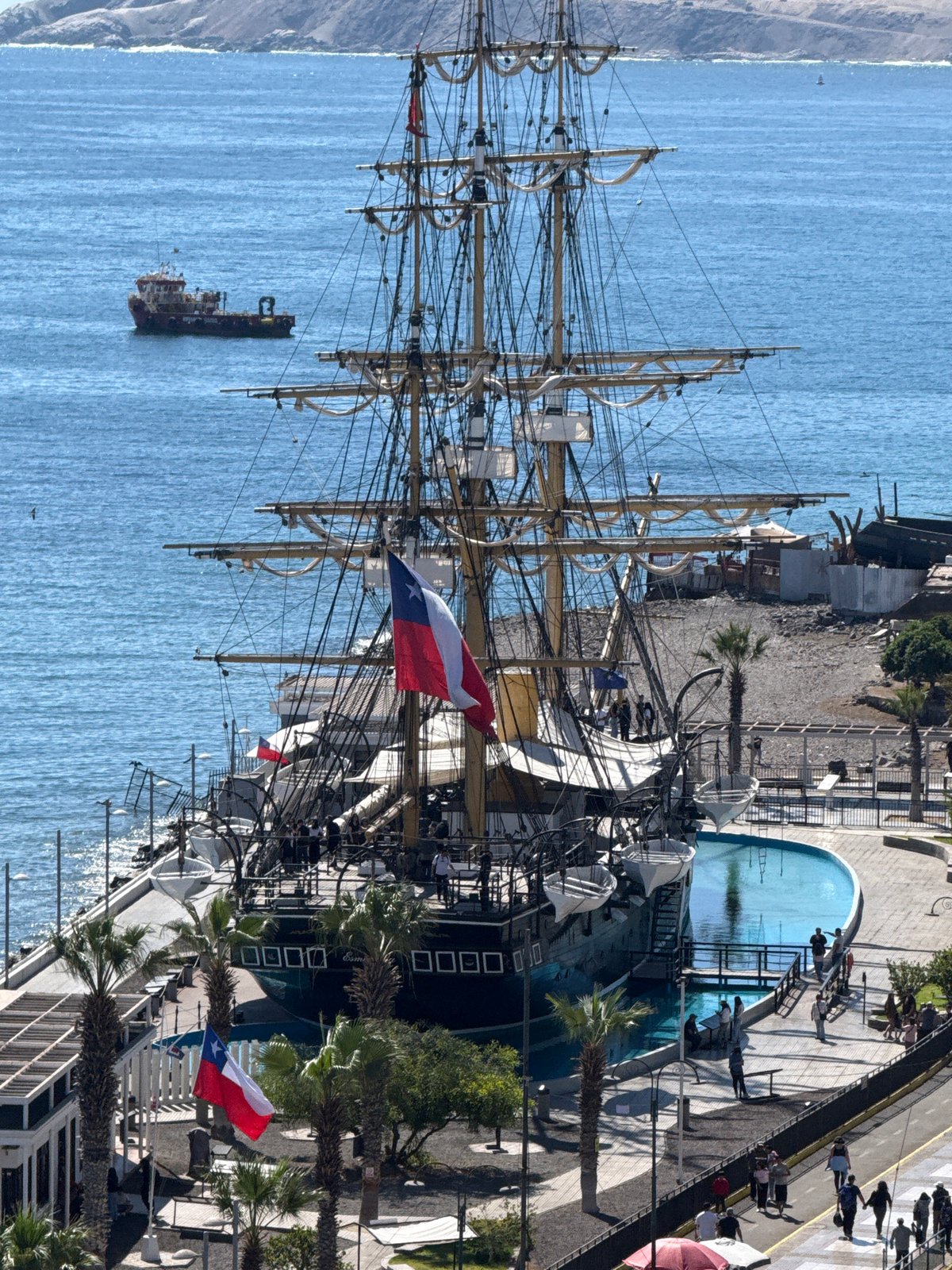 Iquique's port and coastline explored, tall ship in the bay