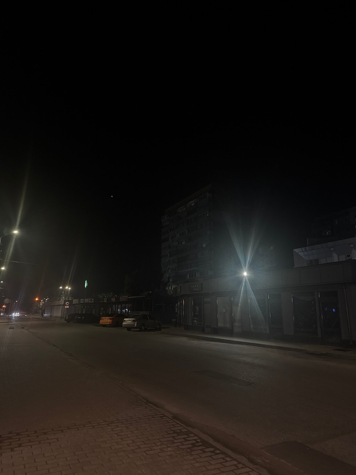 Nighttime street scenes documented across Dnipro, Ukraine city center