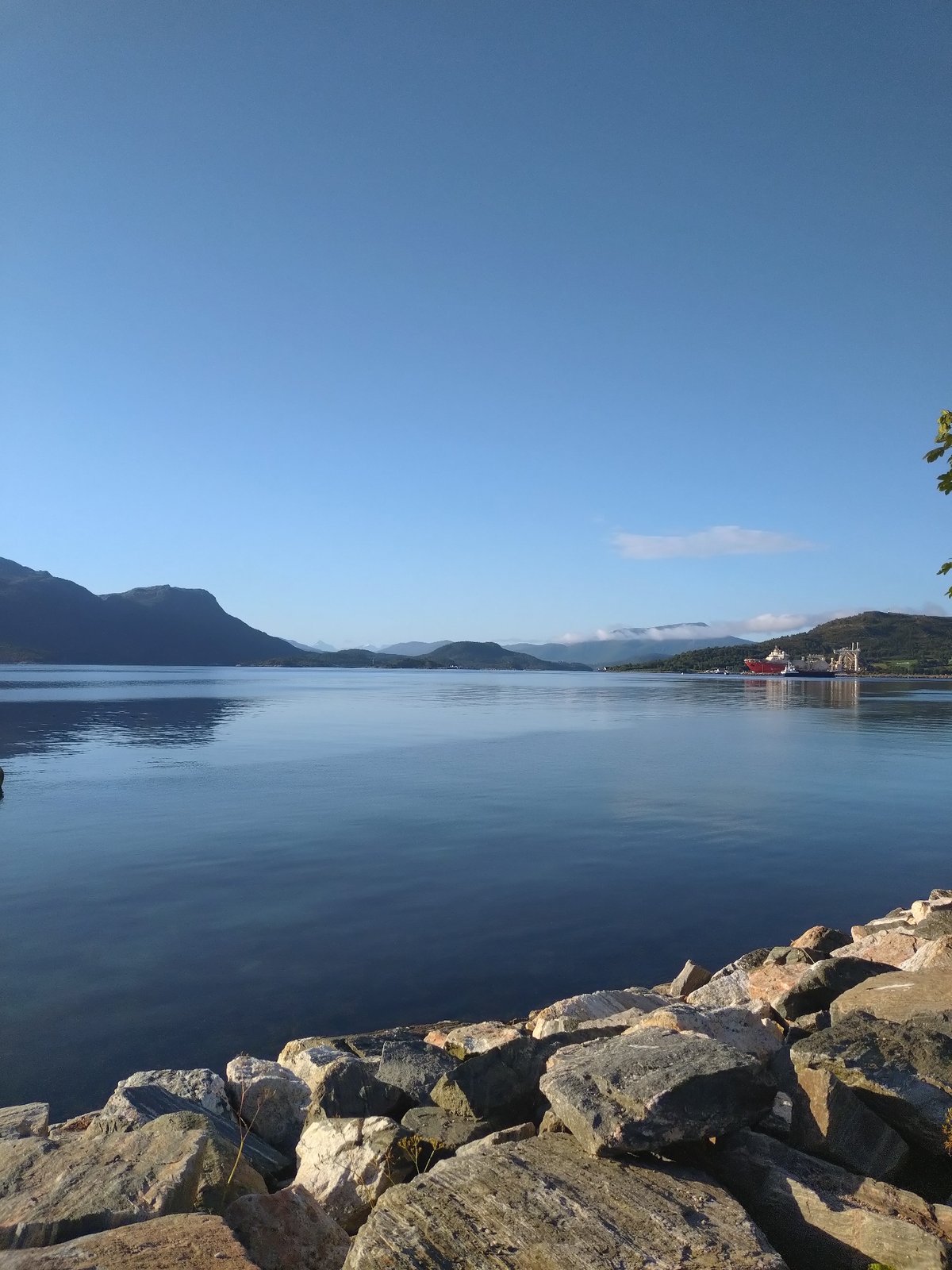 Calm fjord morning at a Bremsnes waterfront