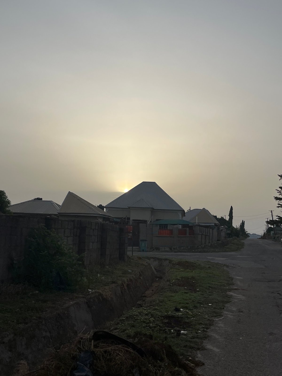 Early morning residential life documented in Abuja neighborhood