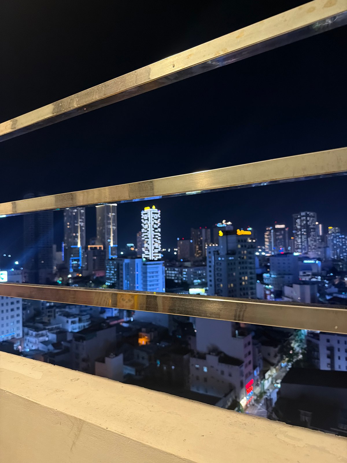 Unknown witness documents Nha Trang nighttime cityscape from elevated position