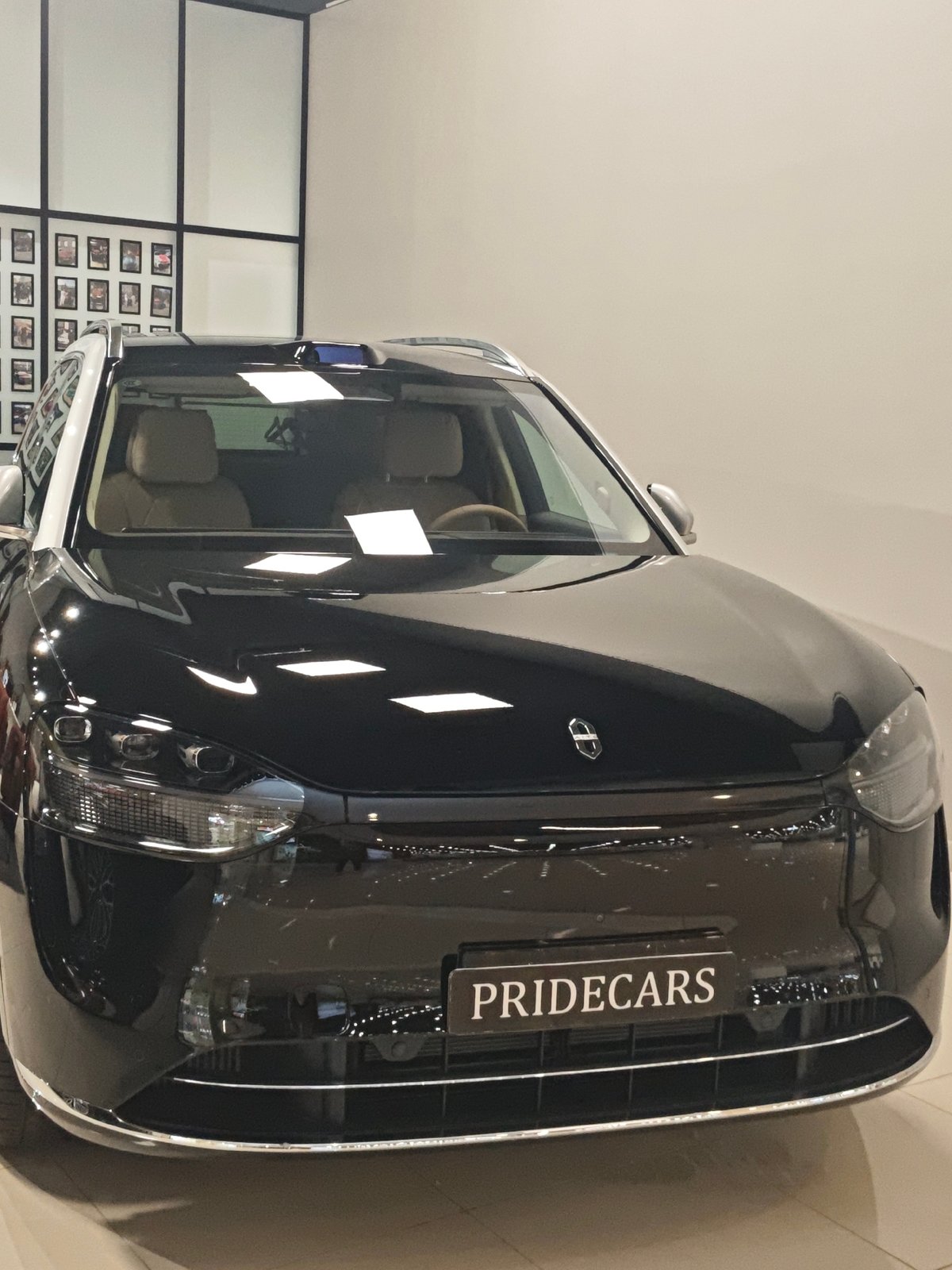 Inside a Moscow mall: cars, art, and an indoor fountain