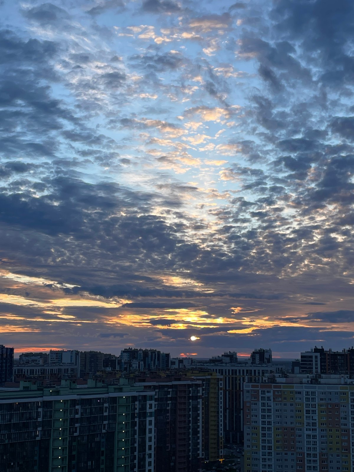 Dusk street scenes and home moments from a Russian city evening