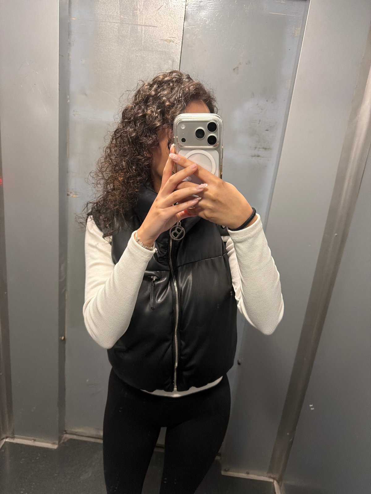 Woman takes elevator selfie in Sofia