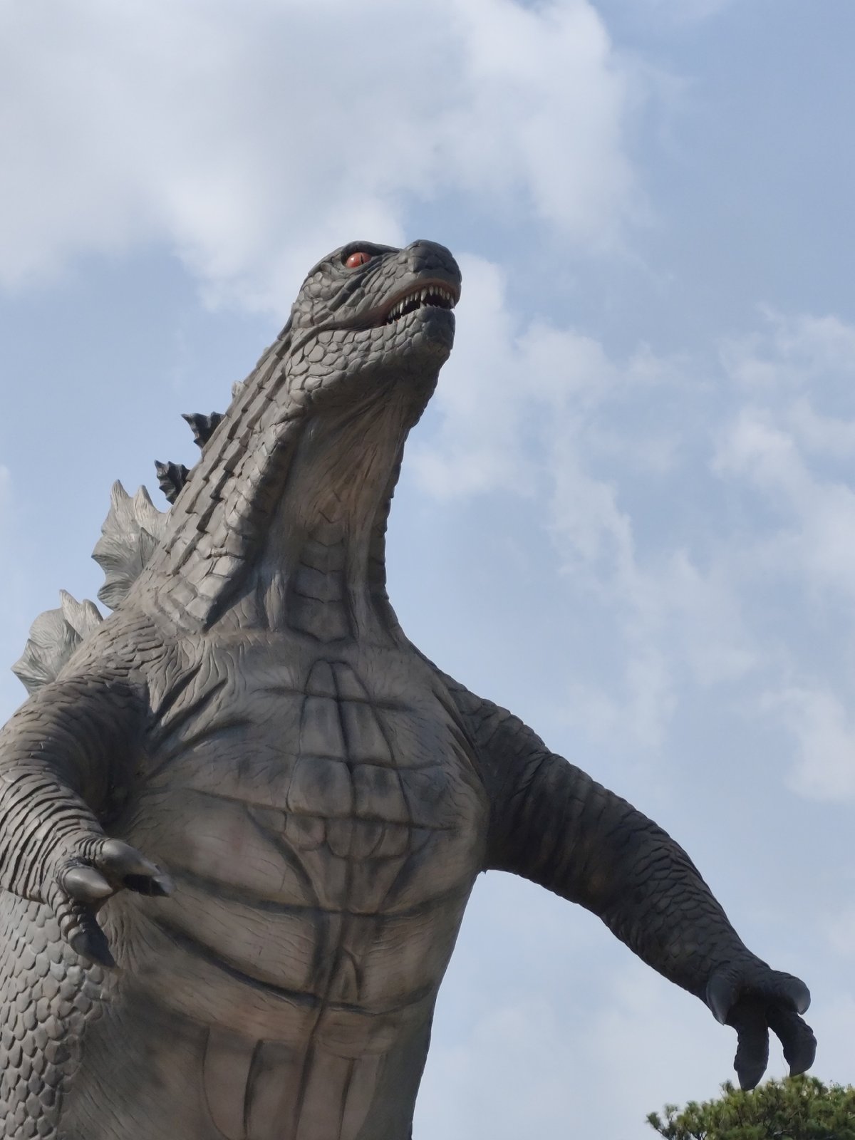 Godzilla statue photographed at Đà Lạt restaurant district