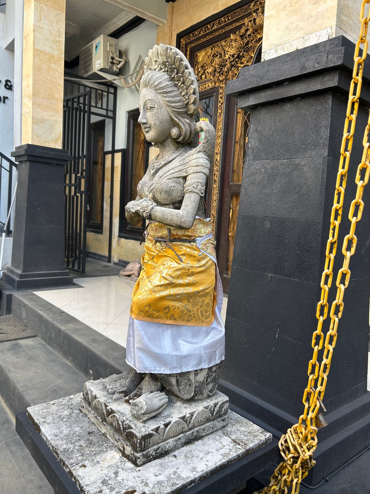 Ornate Balinese compound in Abiansemal, statues and street details