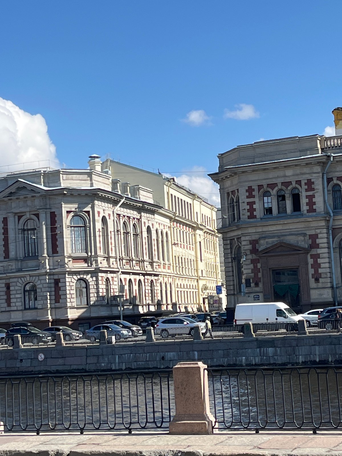 Tourist boat and historic architecture observed in Saint Petersburg