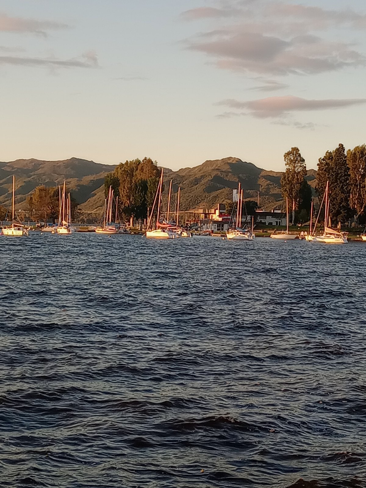 Golden hour lakeside scenes documented in Villa Carlos Paz