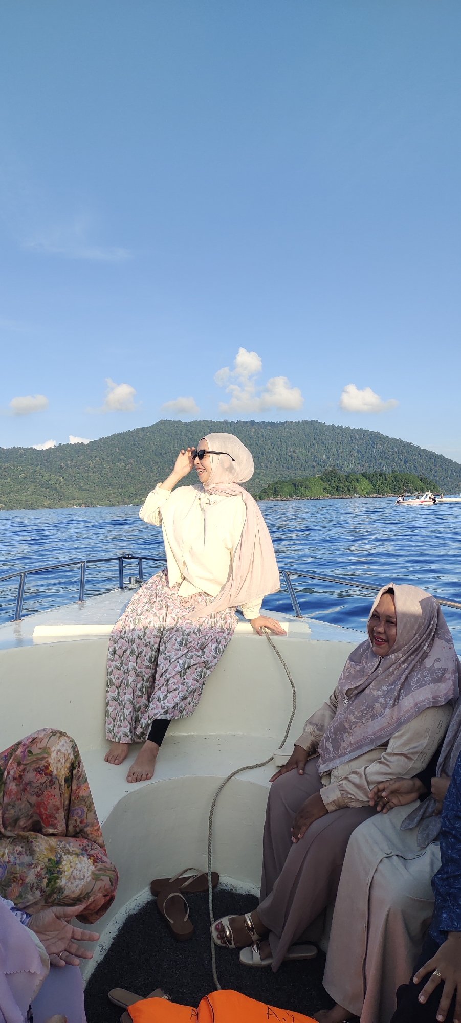 Boat trip near mountainous island in Sabang waters