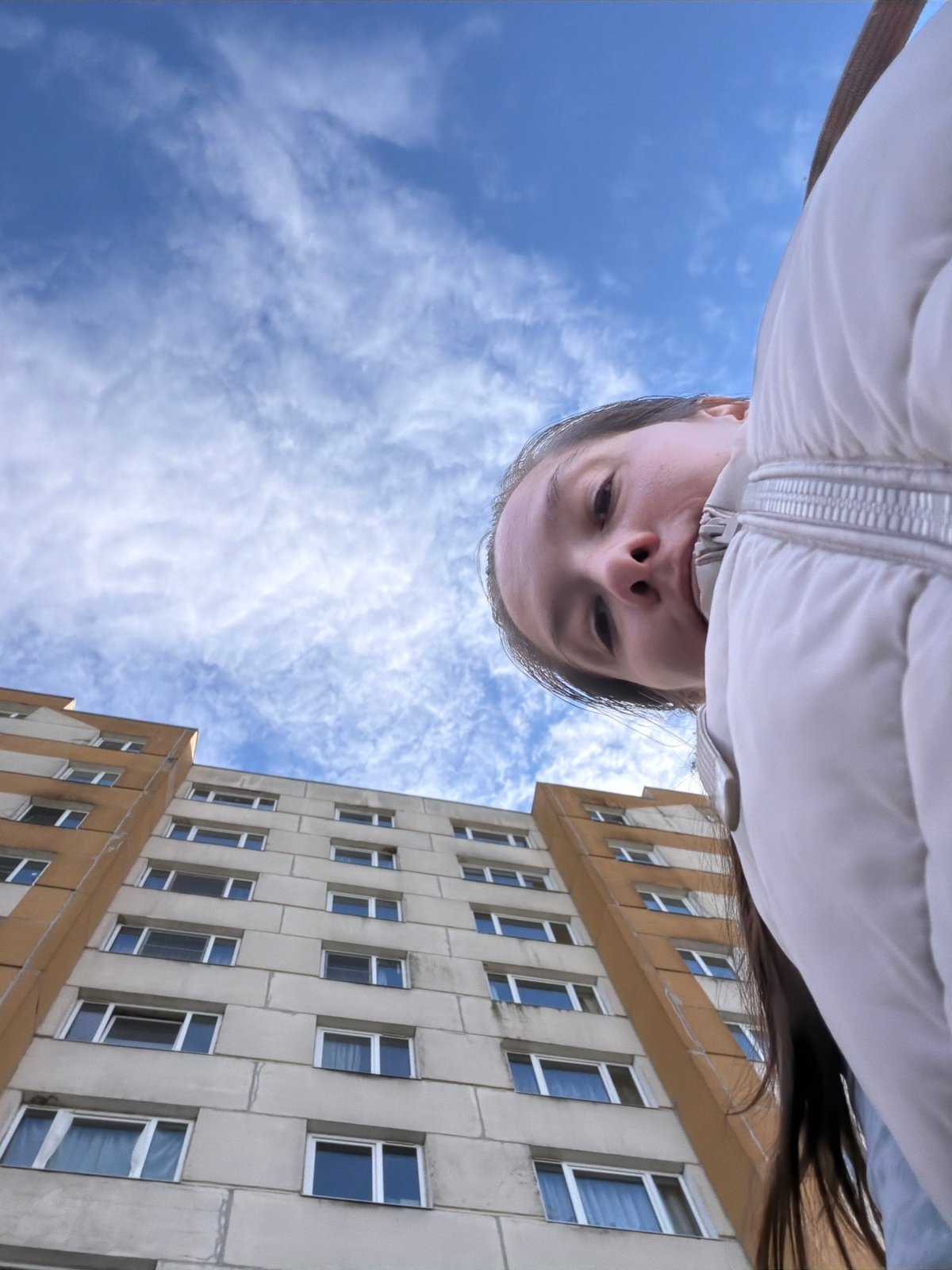 Woman photographed outdoors in Staraya, Russia amid spring weather