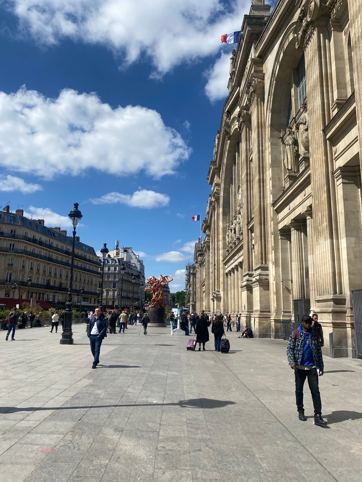 Everyday moments captured across Paris on sunny April morning