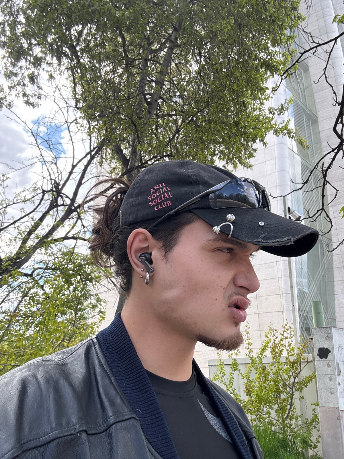 Young man photographs himself at Sofia University campus