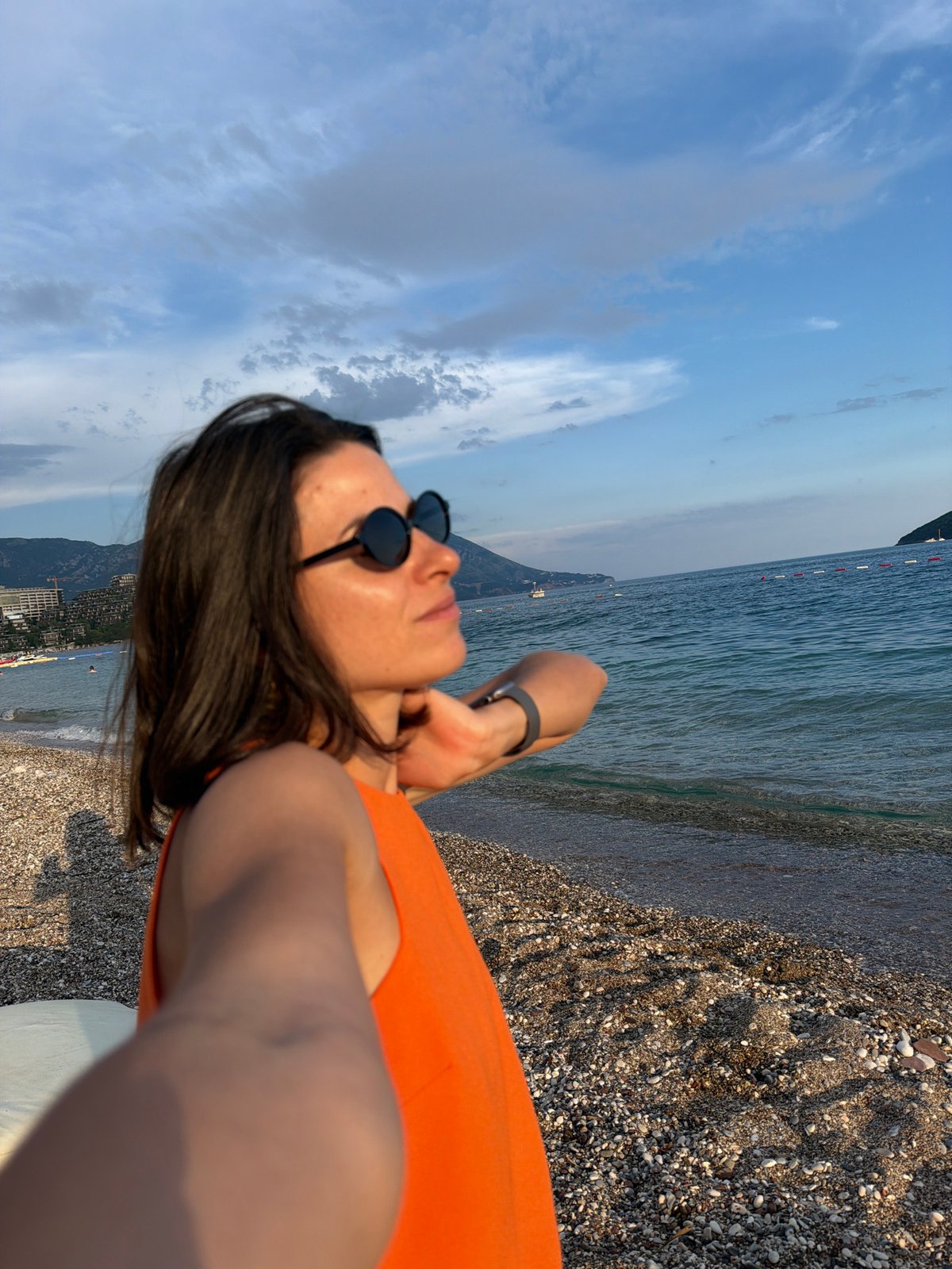 Summer beach day unfolds along Budva's Adriatic coastline