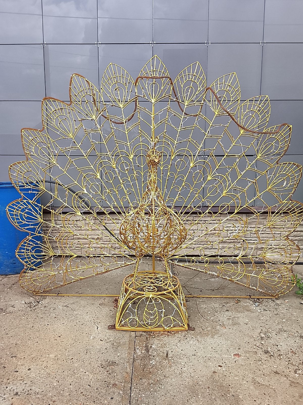 Garden decorations documented in Kuyeda including peacock sculpture, planters