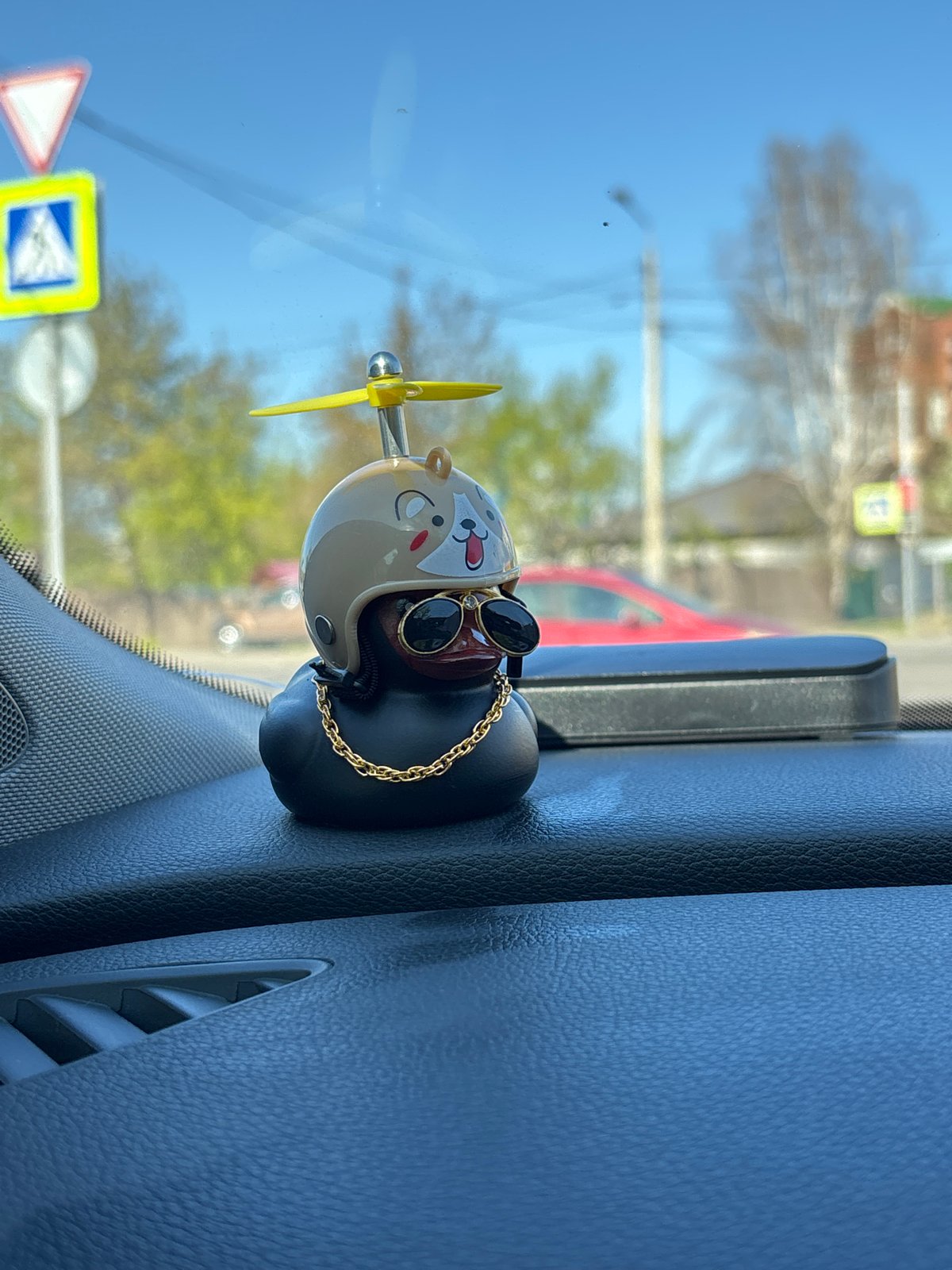 Morning commute documented with dashboard toys in Krasnoyarsk traffic