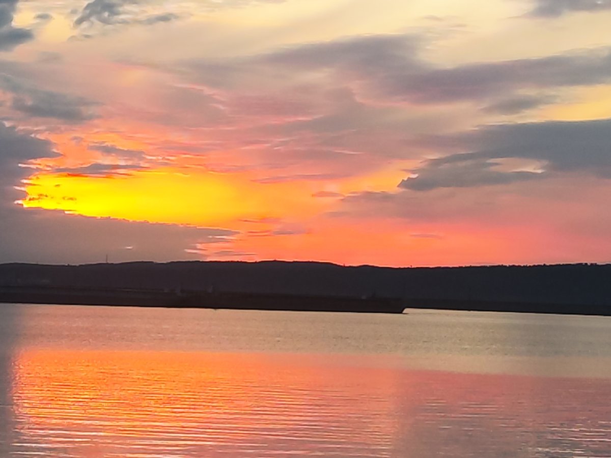 Dramatic sunset over Kama River captured in Chaikovsky, Russia
