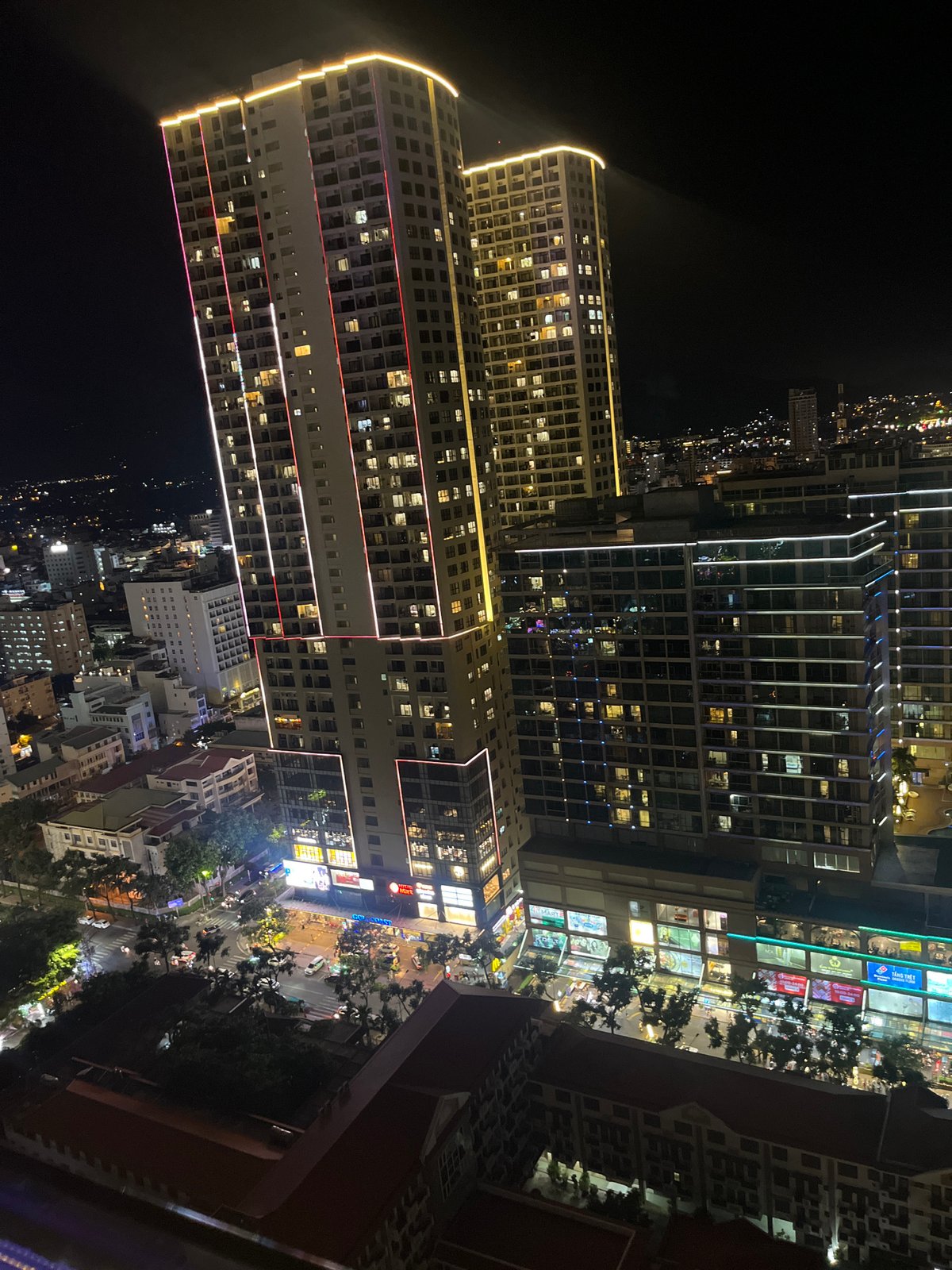 Rooftop dining and city views in nighttime Nha Trang