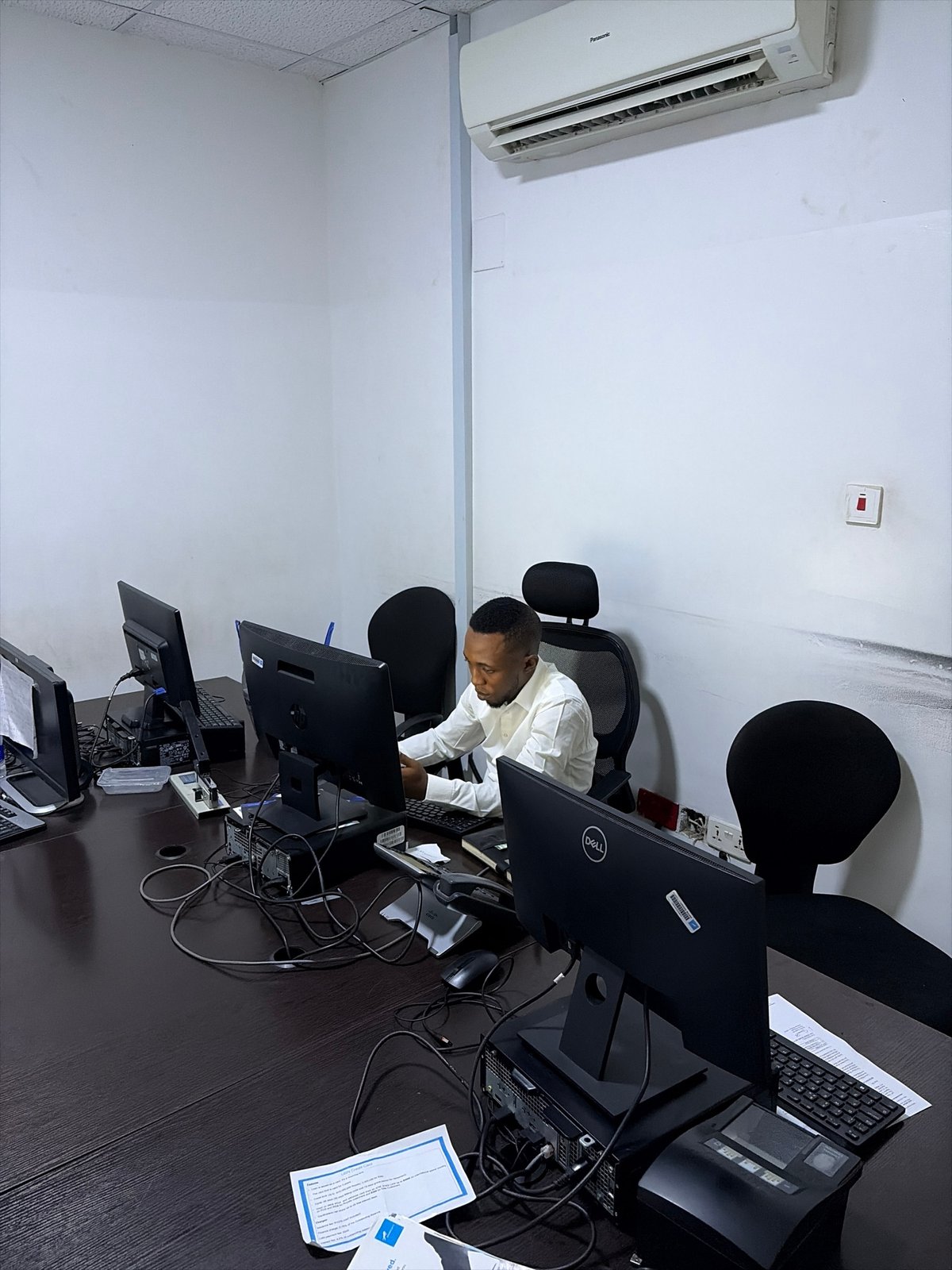 Workplace scenes documented in Abuja office buildings