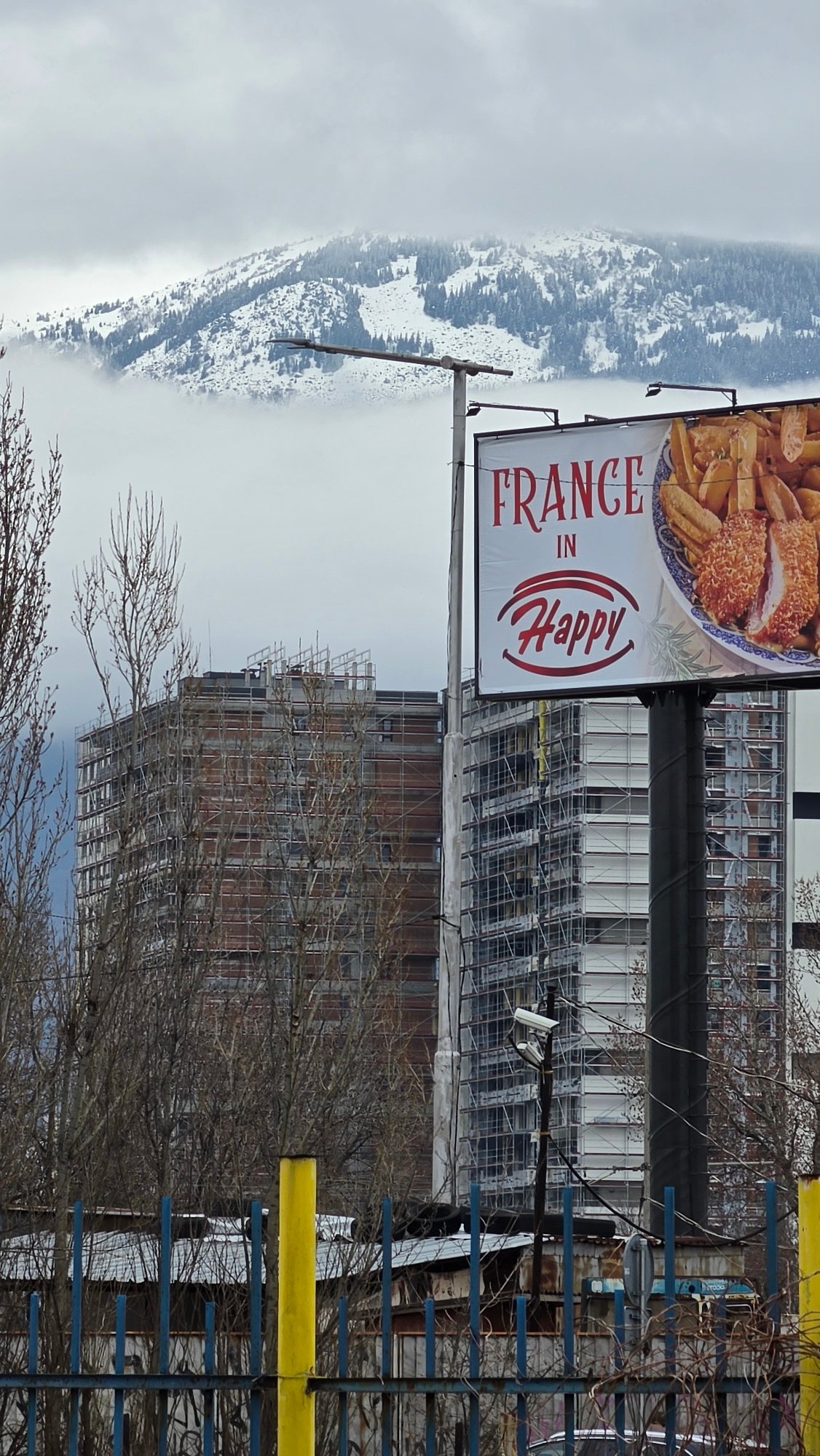 Morning scenes in Sofia: billboard advertising, decorated pancakes