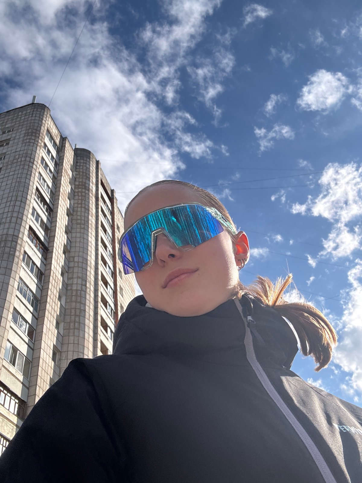 Young person photographed in multiple locations around Chaikovsky, Russia