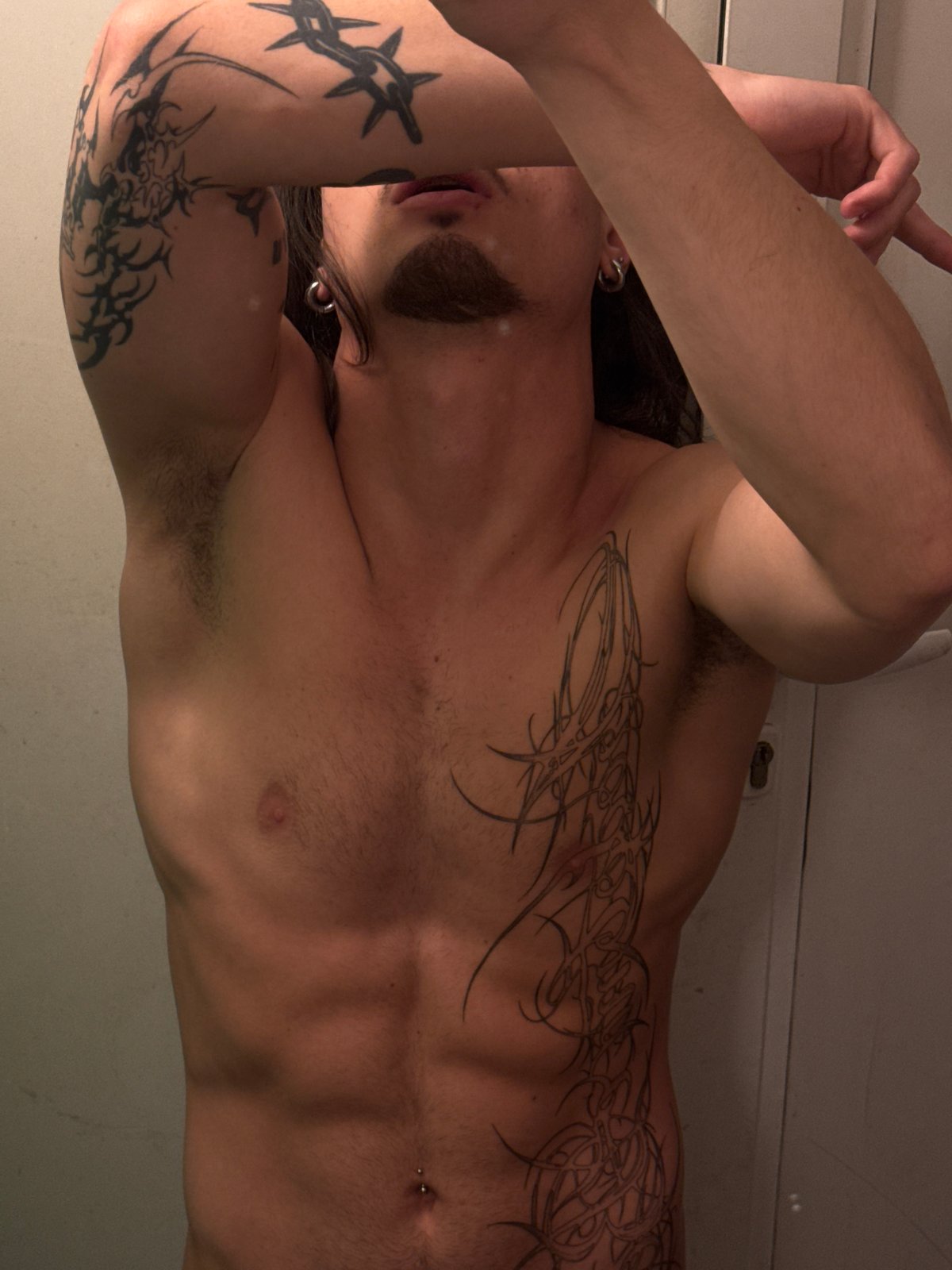 Person takes extended mirror selfie session in Sofia bathroom