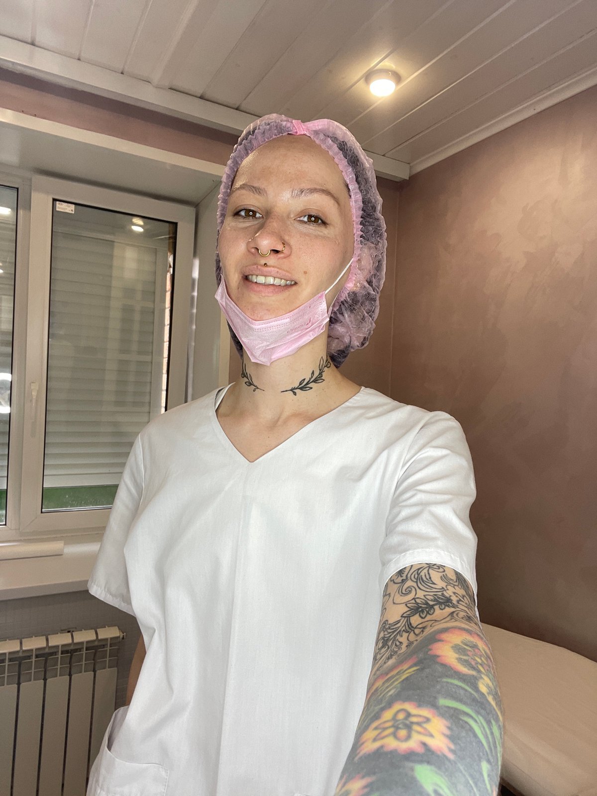 Tattooed healthcare worker photographed at Izhevsk medical facility