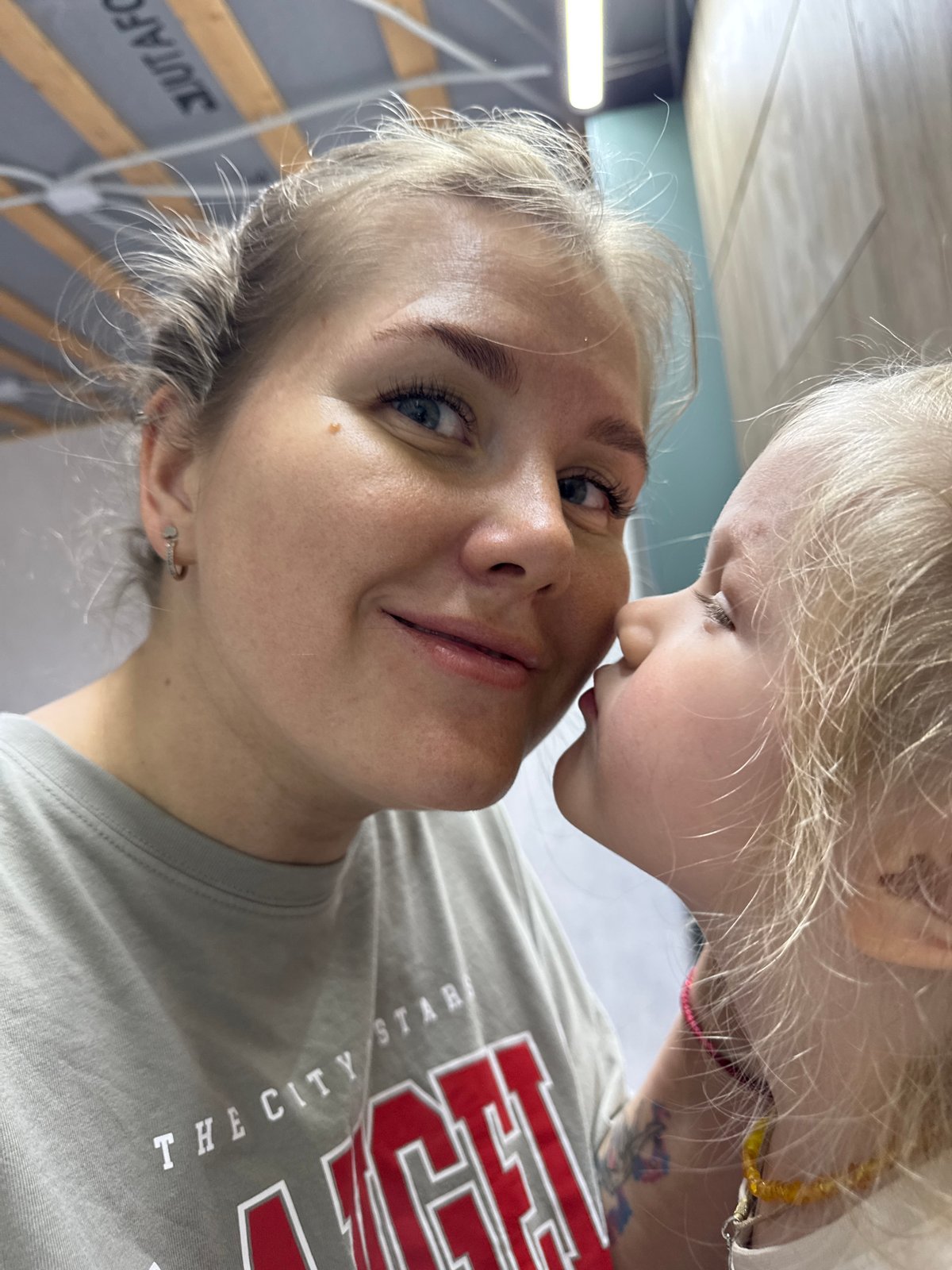 Mother and child share tender moments in Russian home