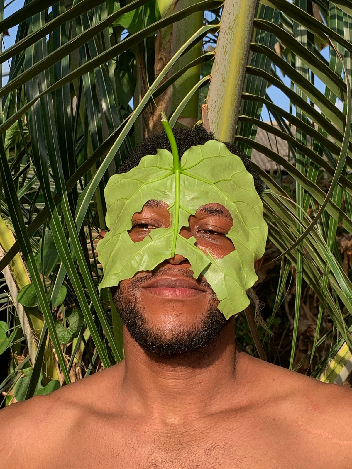 Creative photo shoot features leaf mask in Ikorodu