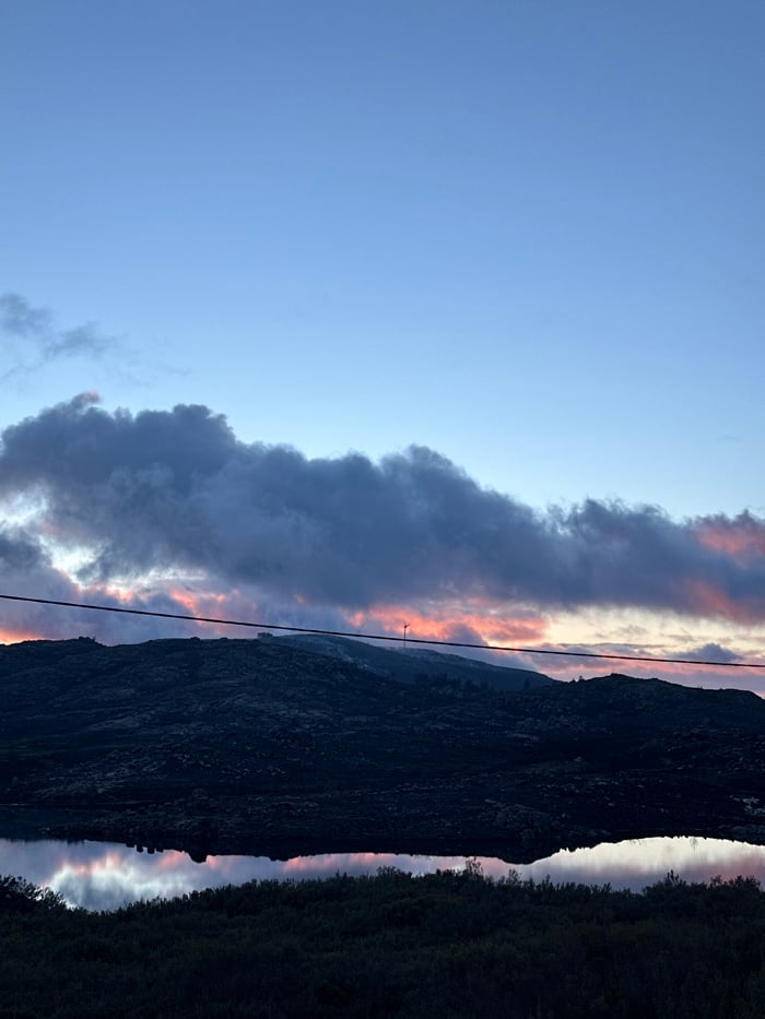 Sunset photography session at Portuguese mountain lake documented