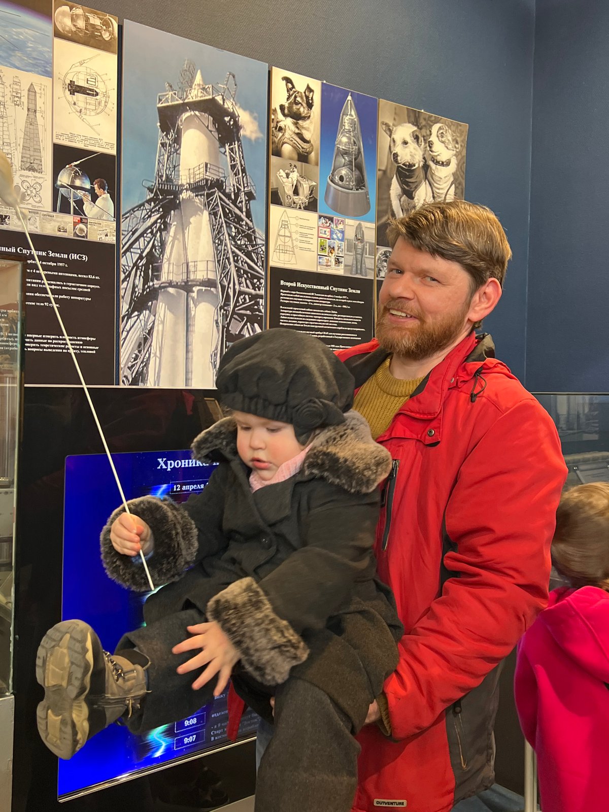 Father and child explore Soviet space museum in Saint Petersburg