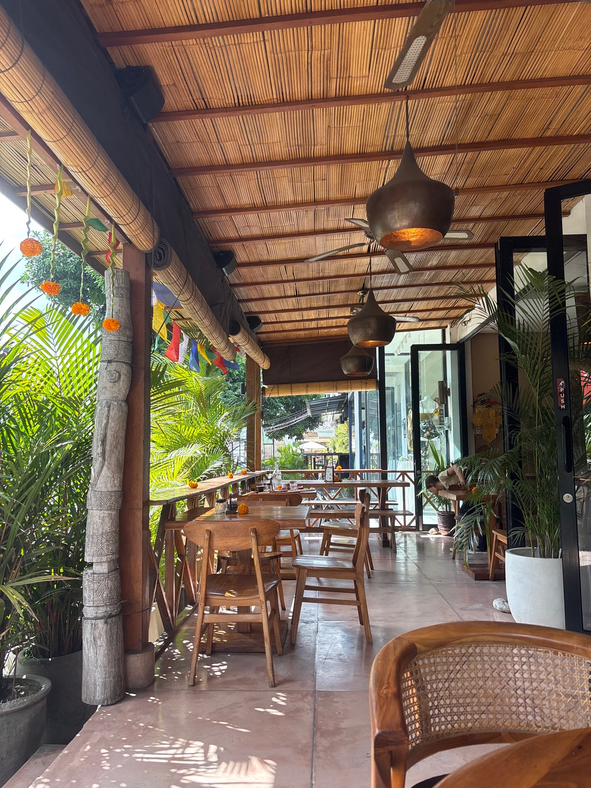 Late-night documentation of bamboo restaurant interior in Kuta Selatan