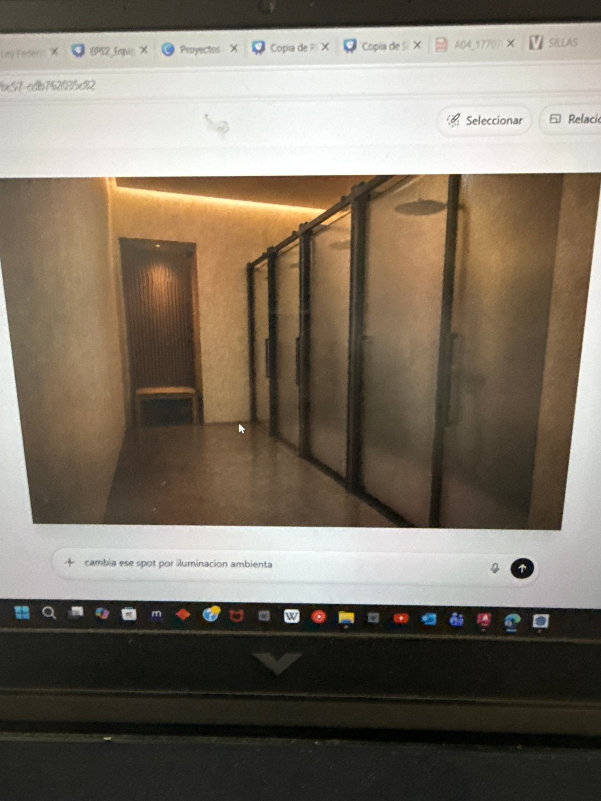 Computer screen shows interior room photo in Puebla
