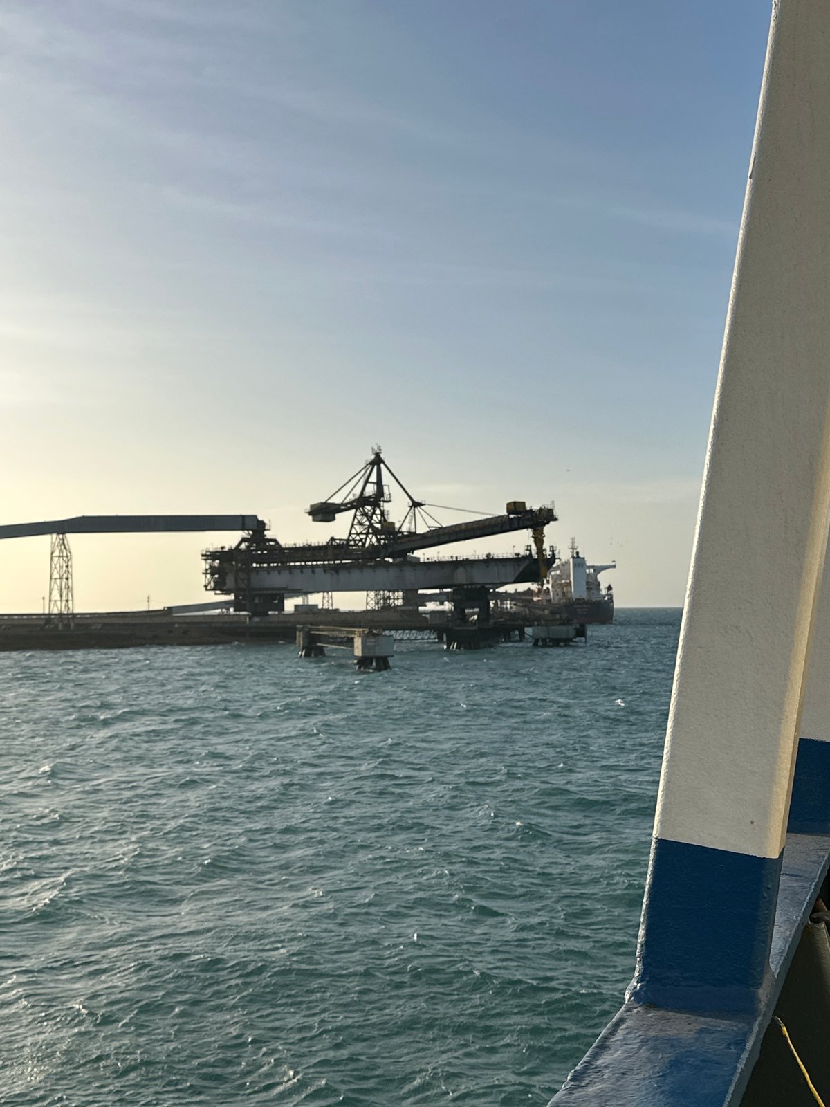 Evening cargo operations documented at Colombian port facility