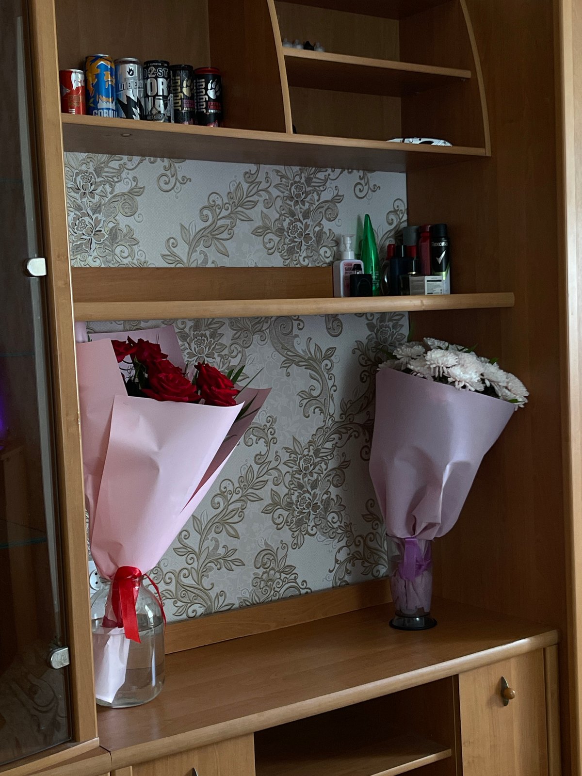 Light-wood cabinet with energy drinks documented in Bender, Moldova